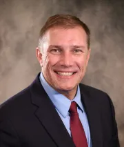 Mark Thomas, Escoute Consulting International logo