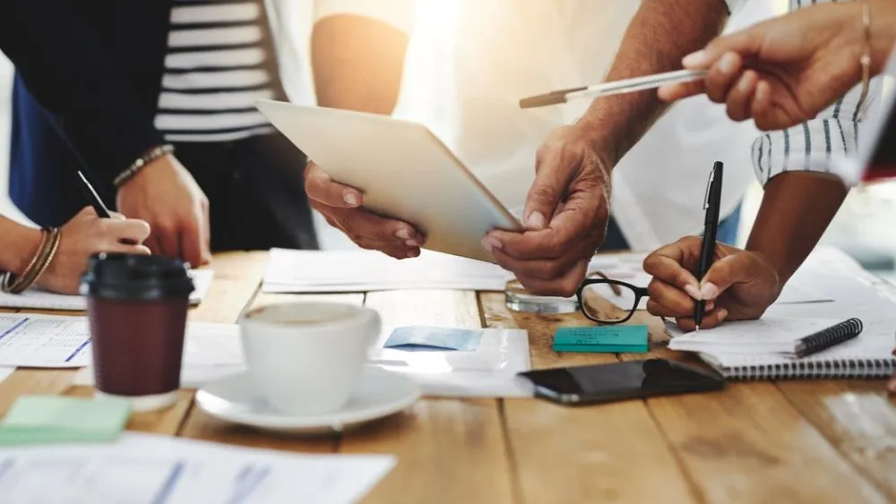 People discussing a portfolio of projects