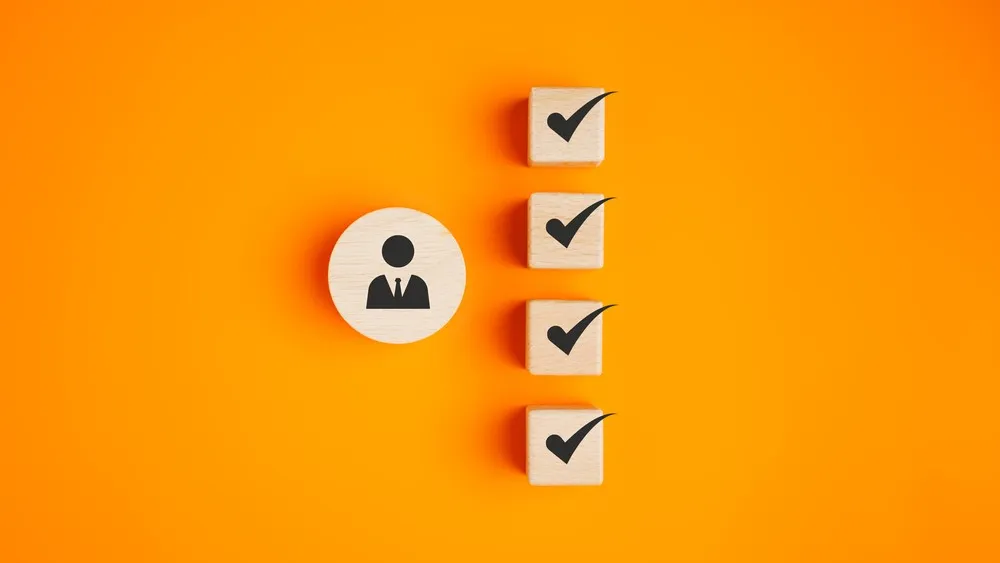 Person with ticks - representing Competency