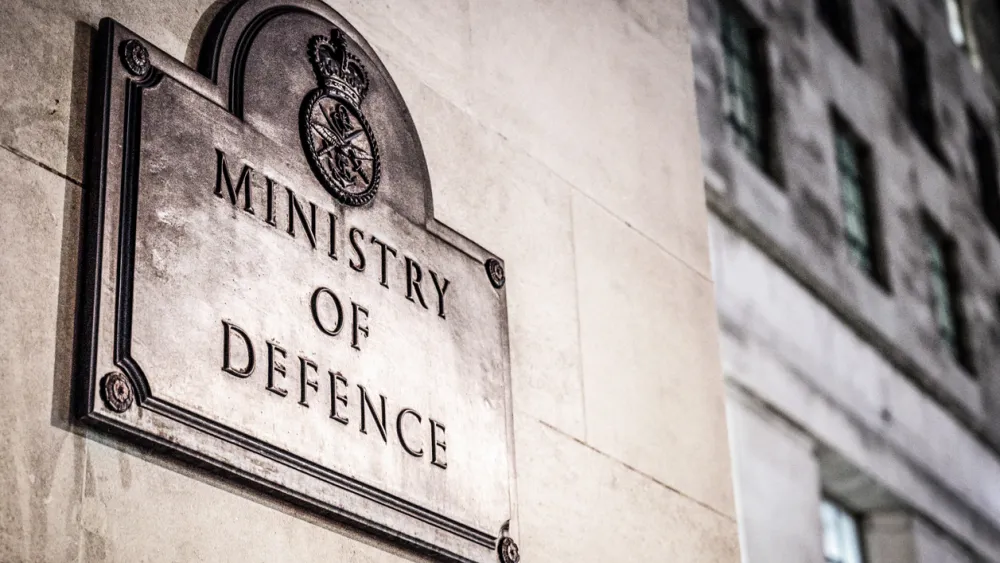 Plaque with Ministry of Defence on stone building wall